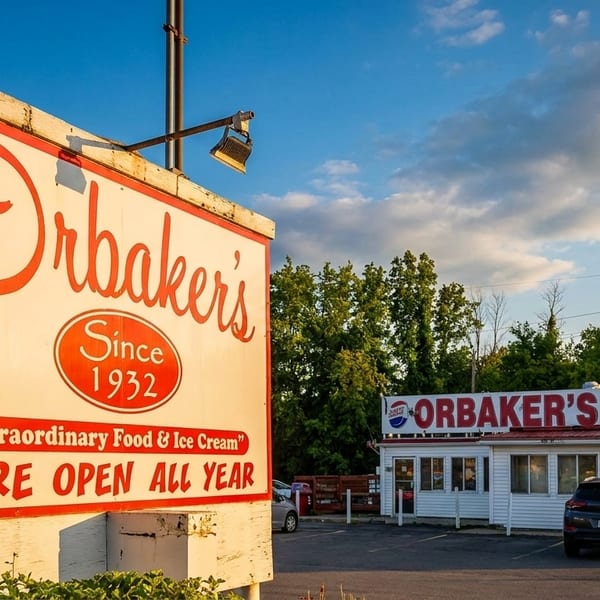 OrbaKer's restaurant sign and building, advertising "Extraordinary Food & Ice Cream" since 1932.